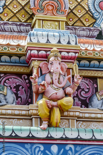 Hindu God Ganesha statue in temple, island Mauritius, close up © OlegD