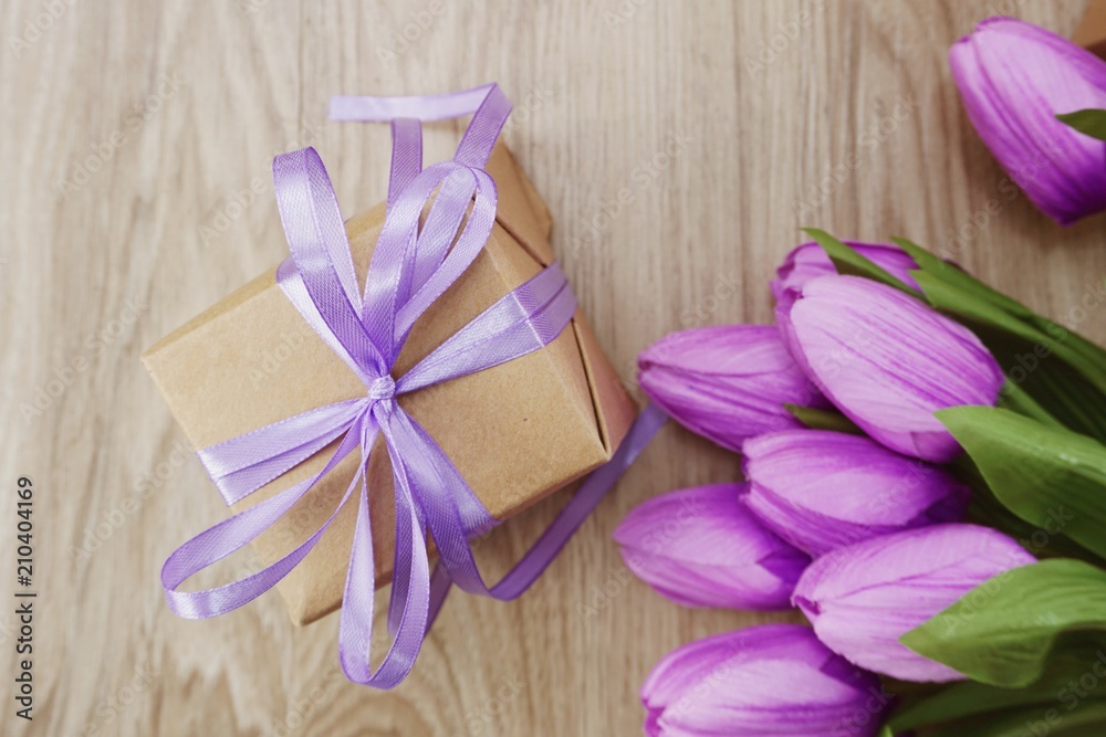 top view gift box present with ribbon on wooden background top view gift box present with ribbon on wooden background