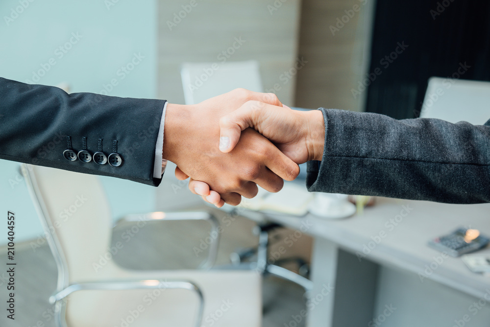 Business people shaking hands partner successful team leader and business  meeting.