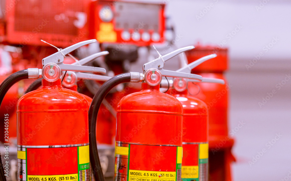 Red tank of fire extinguisher Overview of a powerful industrial fire extinguishing system. Red tank of fire extinguisher Overview of a powerful industrial fire extinguishing system.