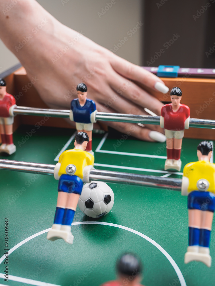 Fototapeta premium Mini table football foosball soccer. trick cheat gate