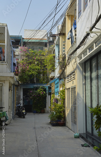 Fototapeta Naklejka Na Ścianę i Meble -  A small residential back street in the Tran Hung Alleys area of District 1 in Saigon.
