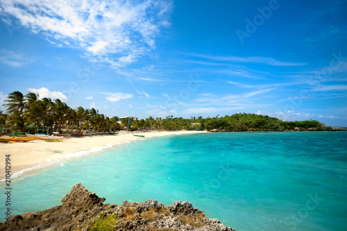 Tropical beach lagoon with palm trees