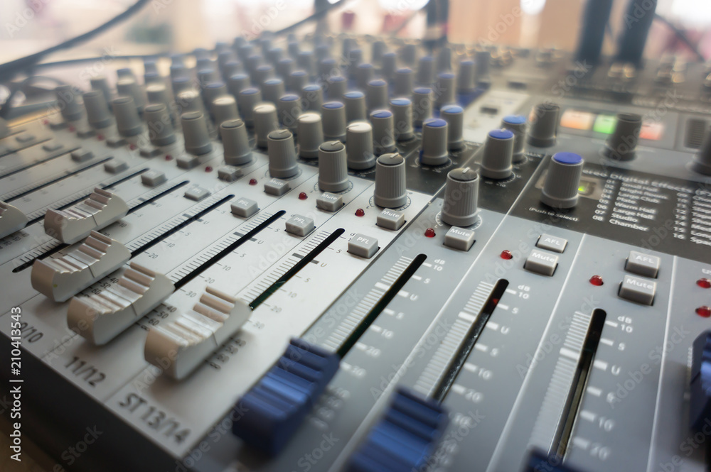 audio mixing console with faders and adjusting knobs audio mixing console with faders and adjusting knobs