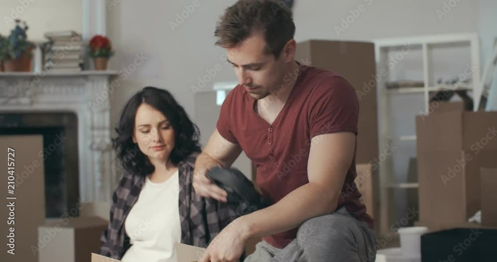 Couple moves and collects their things Couple moves and collects their things