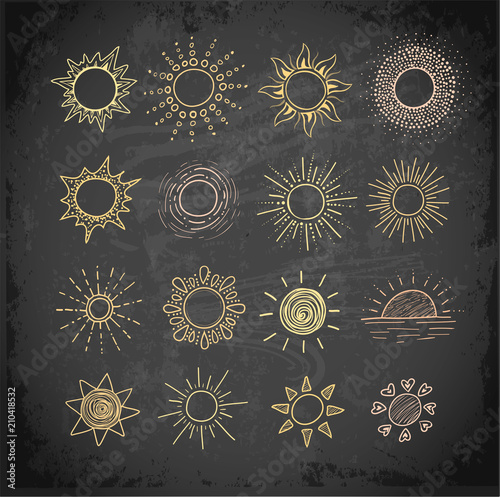 Colored doodle sketches of sun on blackboard background