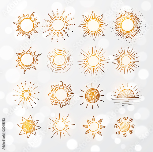 Doodle sketches of golden sun on white glowing background photo