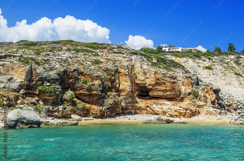 Layered rocks on the southern coast of Crete. The Mediterranean. The Libyan Sea. Greece.
