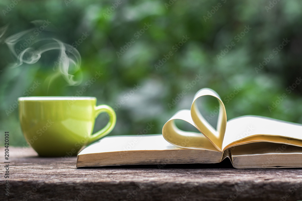 Coffee espresso on wood table nature background in garden,warm tone Coffee espresso on wood table nature background in garden,warm tone