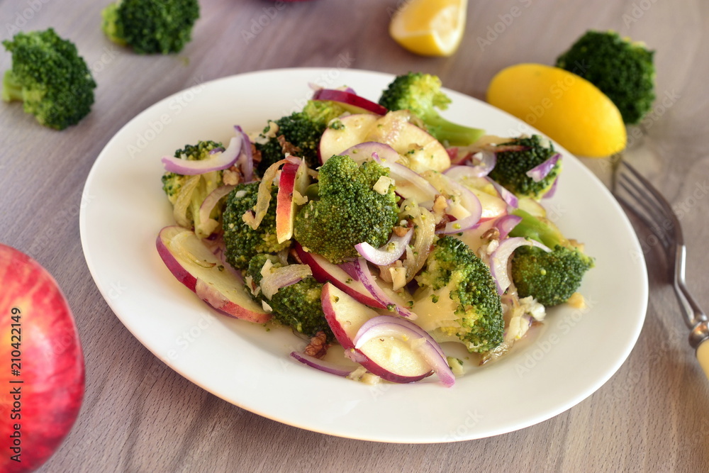 Broccoli with apple, red onion and walnuts Broccoli with apple, red onion and walnuts