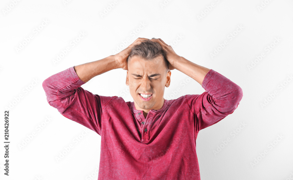 Handsome emotional young man on white background Handsome emotional young man on white background