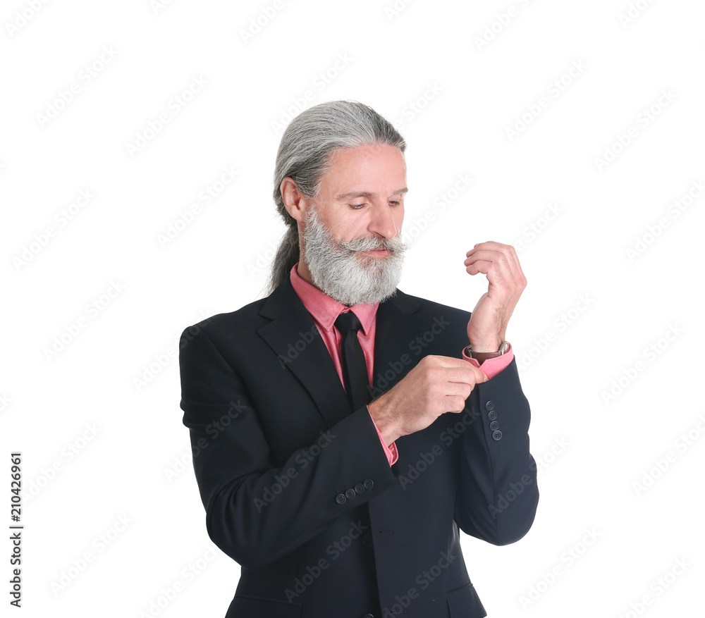 Handsome bearded mature man in suit on white background Handsome bearded mature man in suit on white background