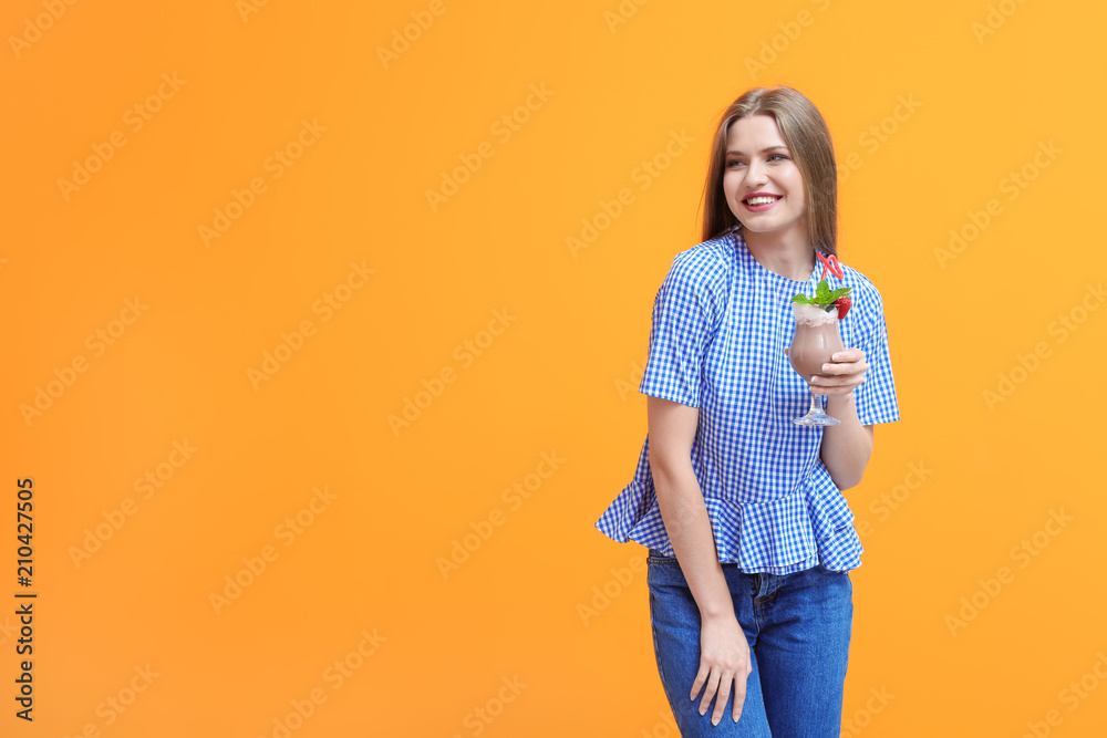 Young woman with glass of delicious milk shake on color background Young woman with glass of delicious milk shake on color background