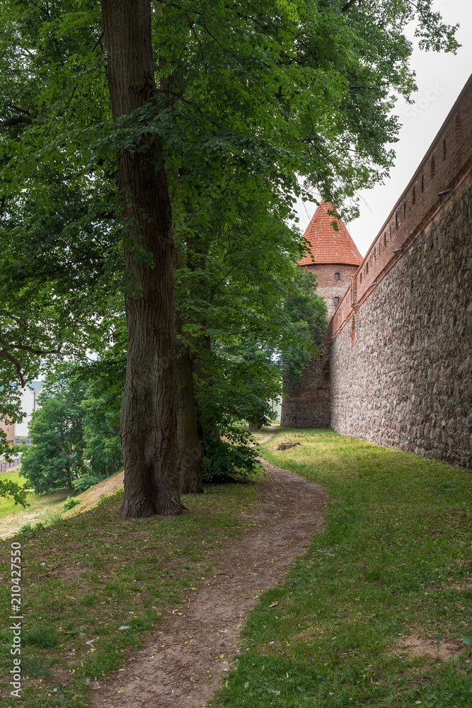 Pathway along gothic castle in Bytow. Poland