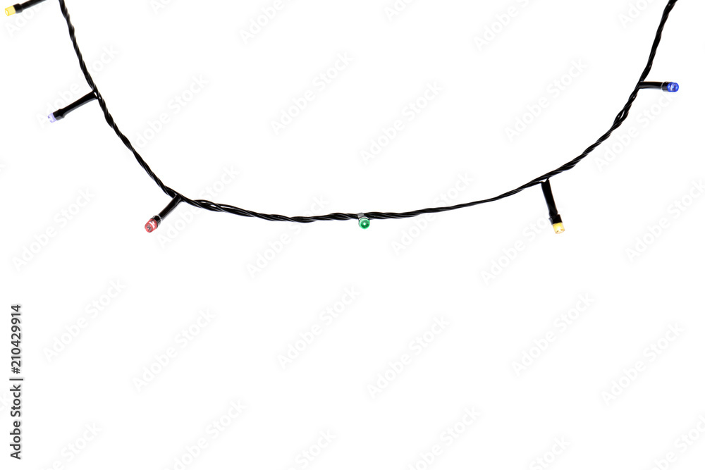 Christmas lights on white background, top view Christmas lights on white background, top view