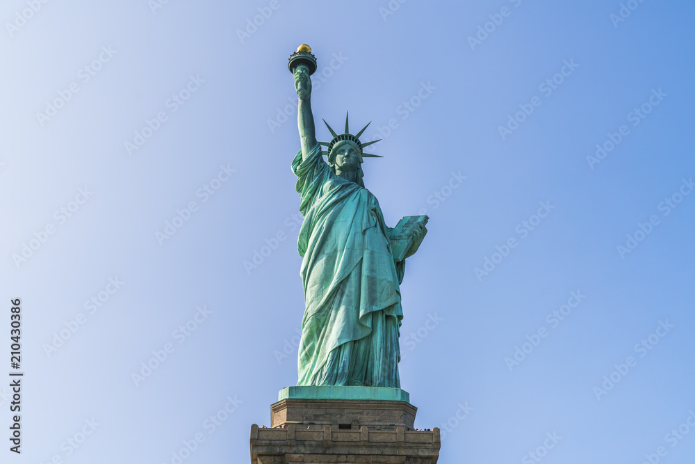 Fototapeta premium The statue of Liberty with blue sky background.