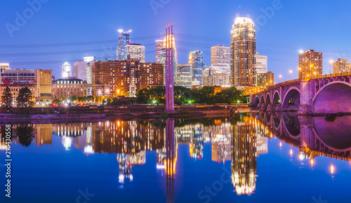  Minneapolis skyline with reflection in river at night.