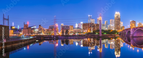  Minneapolis skyline with reflection in river at night. © checubus
