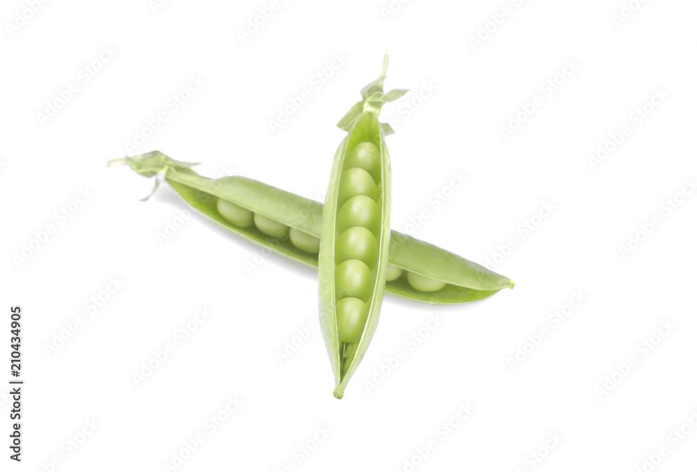 Green, fresh peas in a pod on a white background. isolated Green, fresh peas in a pod on a white background. isolated