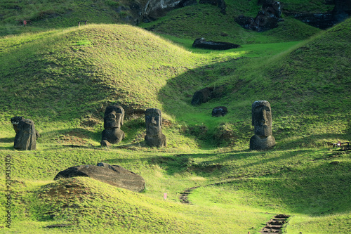 Hundreds of abandoned Moai statue on Rano Raraku volcano, Easter Island, UNESCO World Heritage site of Chile photo