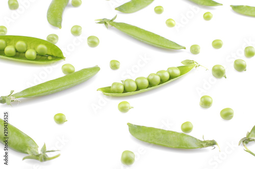 A lot of green, fresh peas in a pod on a white background. isolated