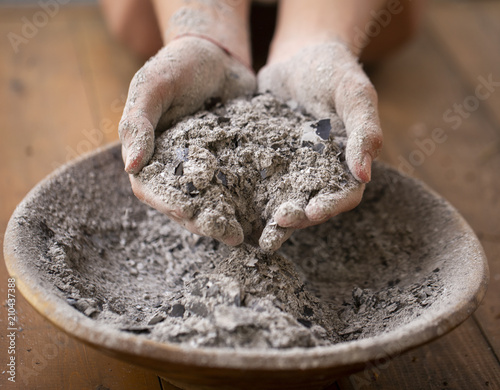 ashes in the hands of a teenager, ashes falling through your fingers