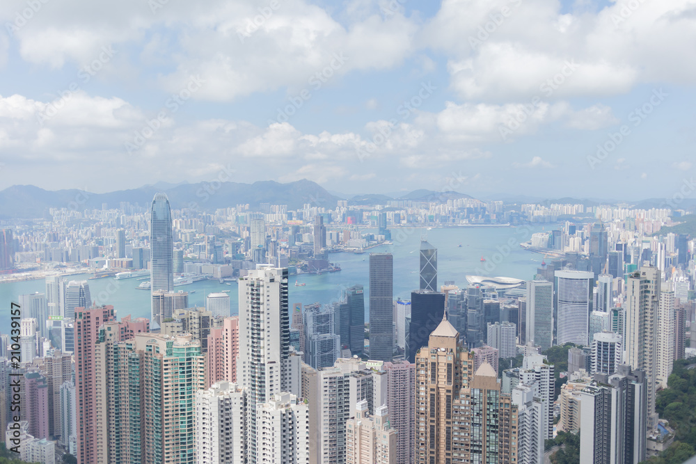 Highrise modern buildings with blue sky in the city at Victoria's Peak, Hong Kong Highrise modern buildings with blue sky in the city at Victoria's Peak, Hong Kong