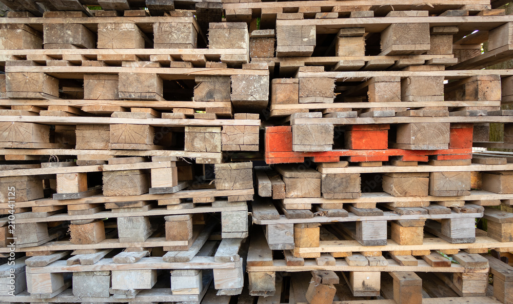 background. neatly folded wooden pallets background. neatly folded wooden pallets