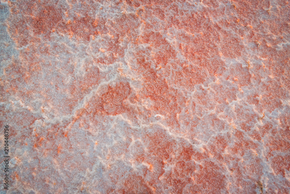 The texture of a dried salt pink lake in Torrevieja in Spain