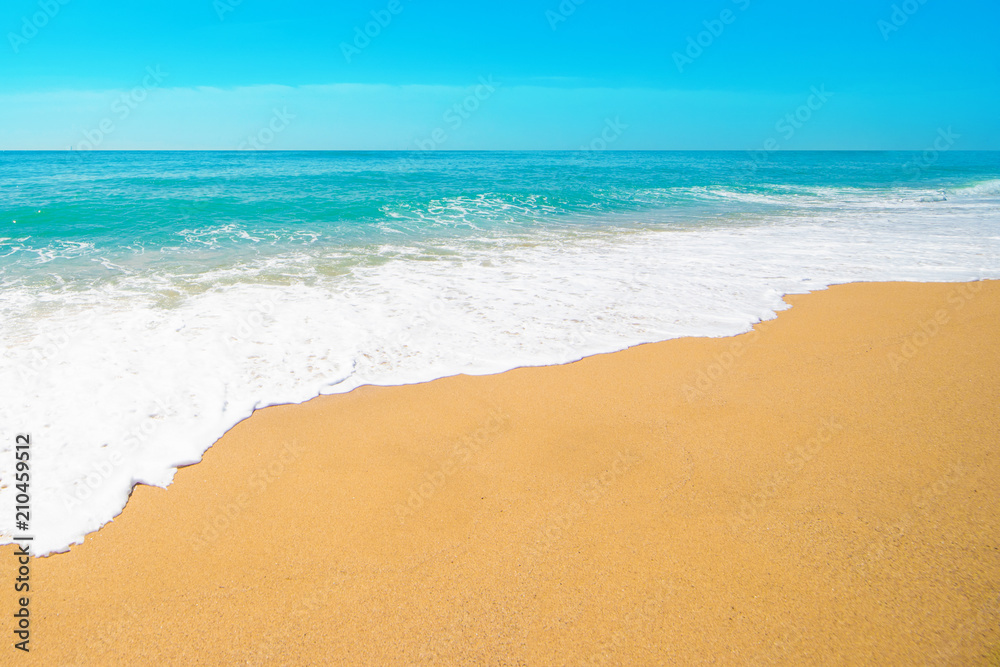 Beautiful Tropical beach with Soft wave of blue ocean, sand and transparent sky. Summer travel holiday background concept. Sea panorama. Beautiful Tropical beach with Soft wave of blue ocean, sand and transparent sky. Summer travel holiday background concept. Sea panorama.