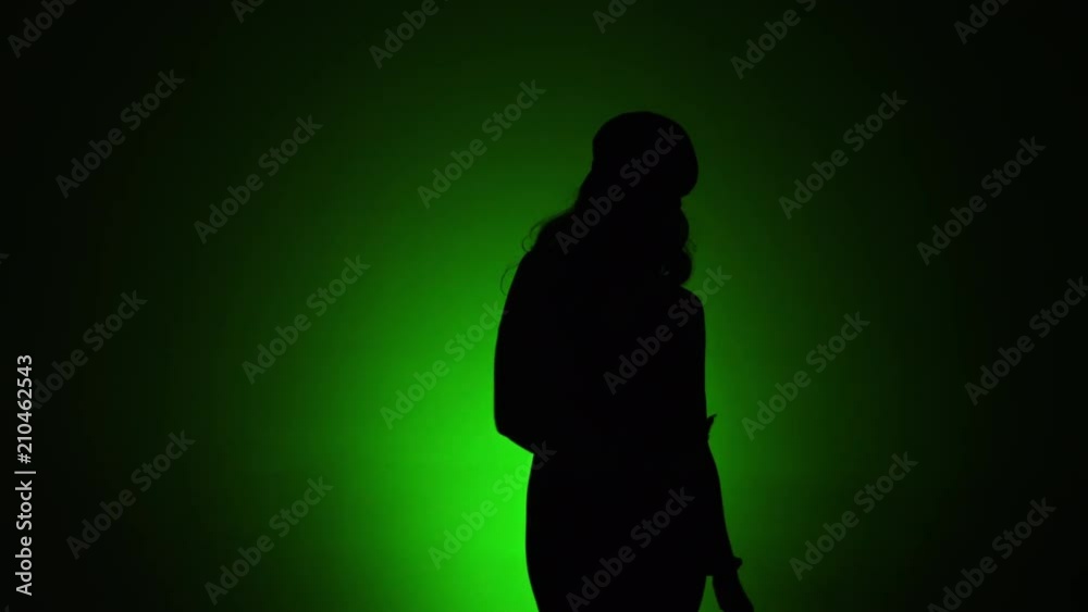 woman dancing silhouette green background 1.mov woman dancing silhouette green background 1.mov