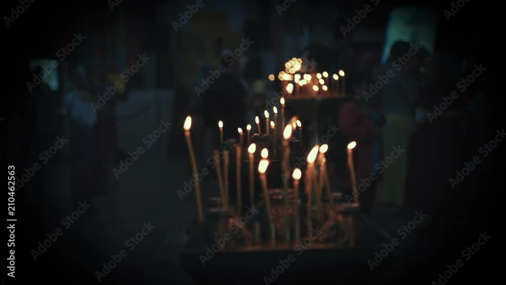 lighted candles in the church close-up