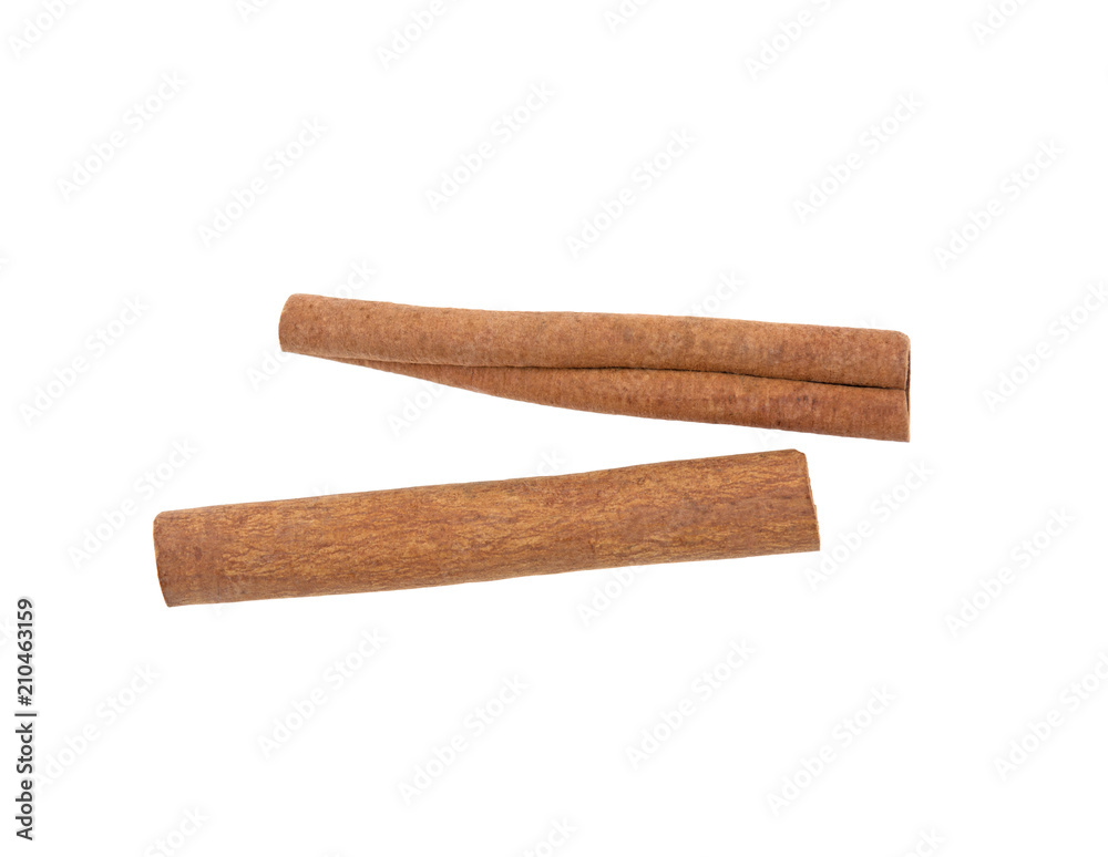 two cinnamon sticks on a white background
