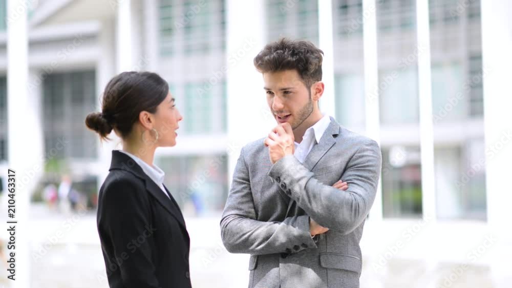 Business partners discussing together Business partners discussing together