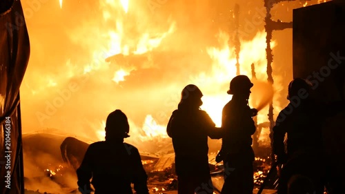 Firefighter Team Stopping A Fire