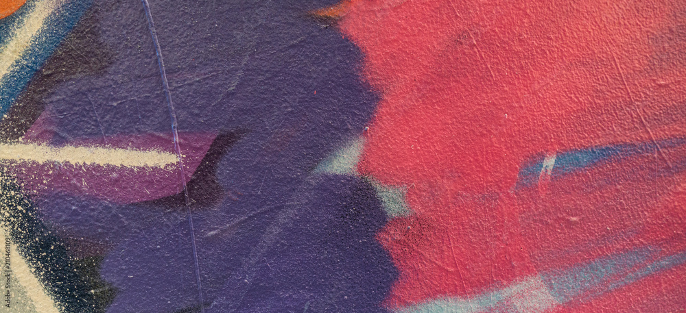 Fototapeta premium Kolorowy graffiti obraz na ścianie, uliczny sztuka sztandaru tło