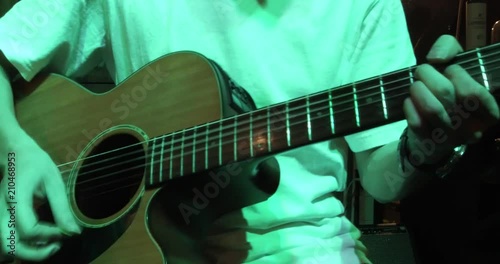 Musician in the restaurant. Bangkok, Thailand. musician play and sing the music for customer to come have dinner in the restaurant at night.