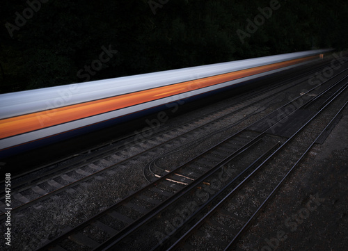 Speeding fast train on an isolated black background
