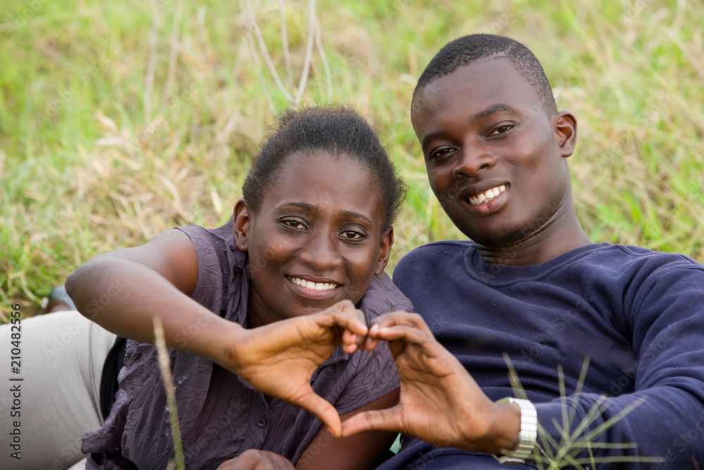 © vystekimages - close up of young african couple, happy. © vystekimages - close up of young african couple, happy.