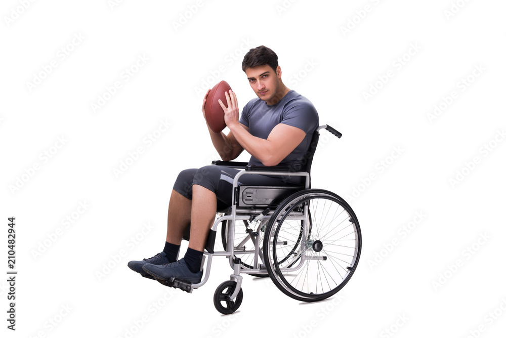 Football player recovering from injury on wheelchair Football player recovering from injury on wheelchair
