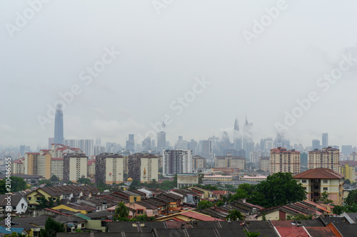 Photography View of cloudy day over downtown Kuala Lumpur, capital city of Malaysia