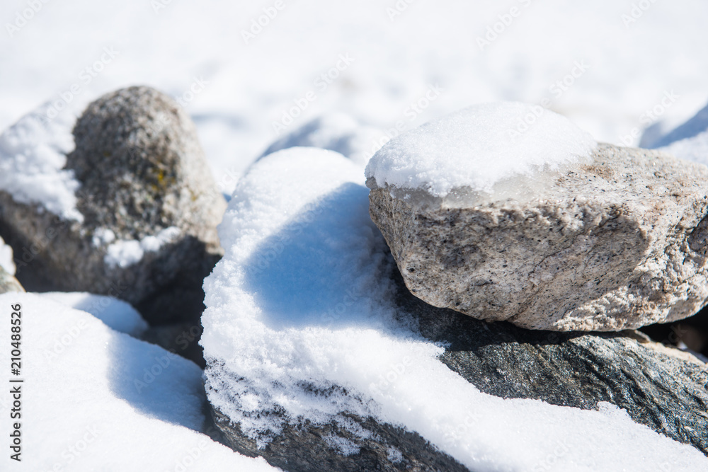 Snow covered on the stone Snow covered on the stone