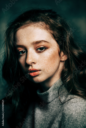 look thoughtful and serious