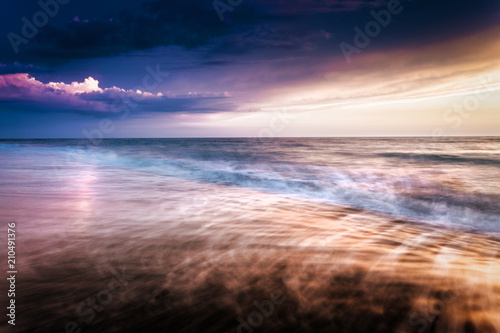 Waves at sunset at mediterranean sea