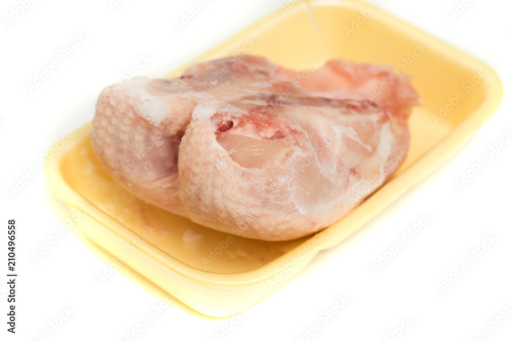 frozen chicken breast on the plate