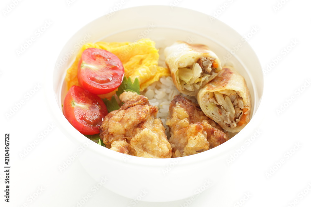 homemade spring roll and fried chicken on rice bento 