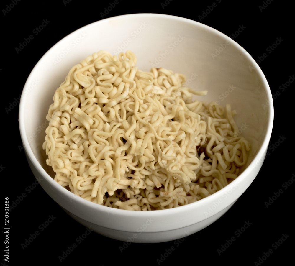 instant noodles food on a black background