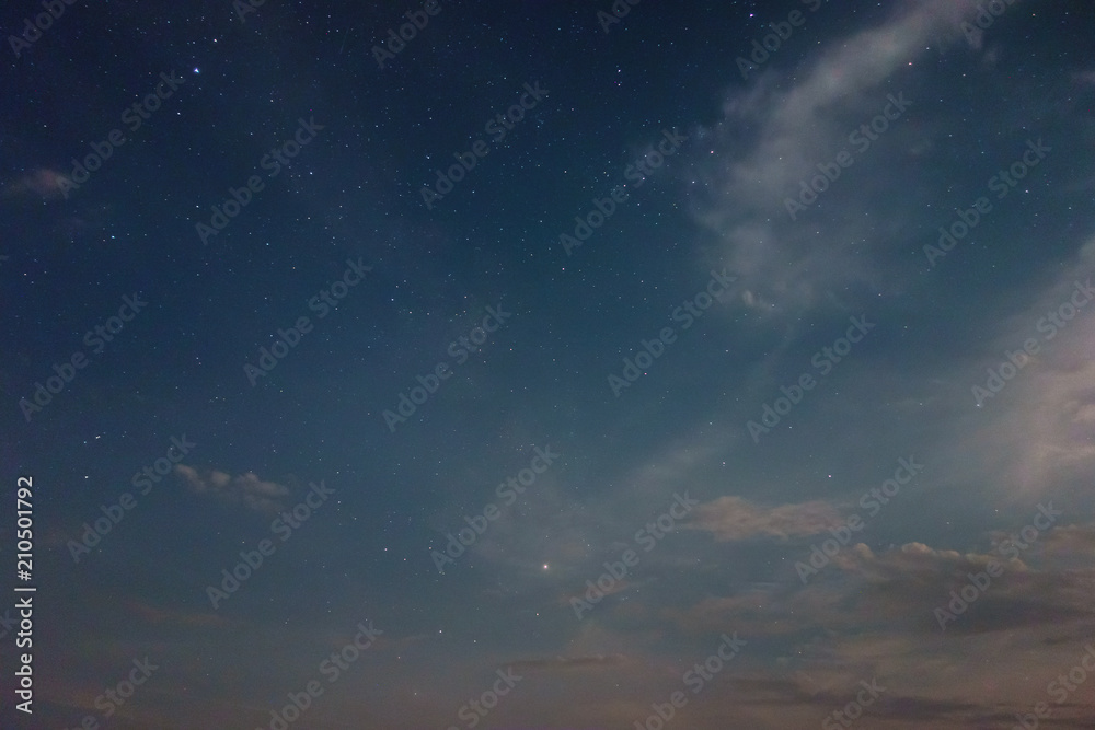 Obraz premium Night sky view with shining stars and the clouds