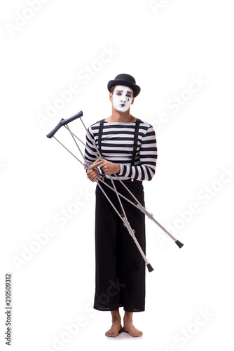 Mime with crutches isolated on white background © Elnur