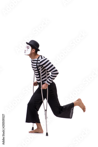 Mime with crutches isolated on white background